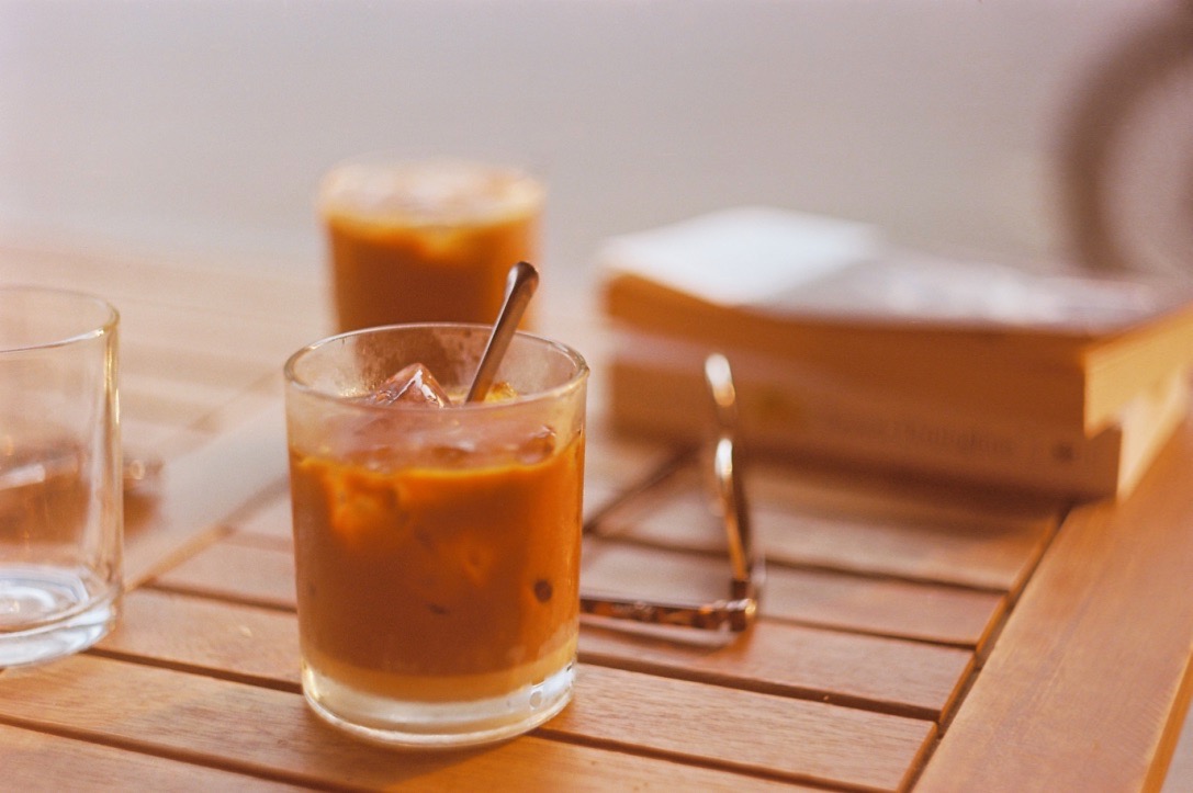vietnamese coffee, book, sunglasses