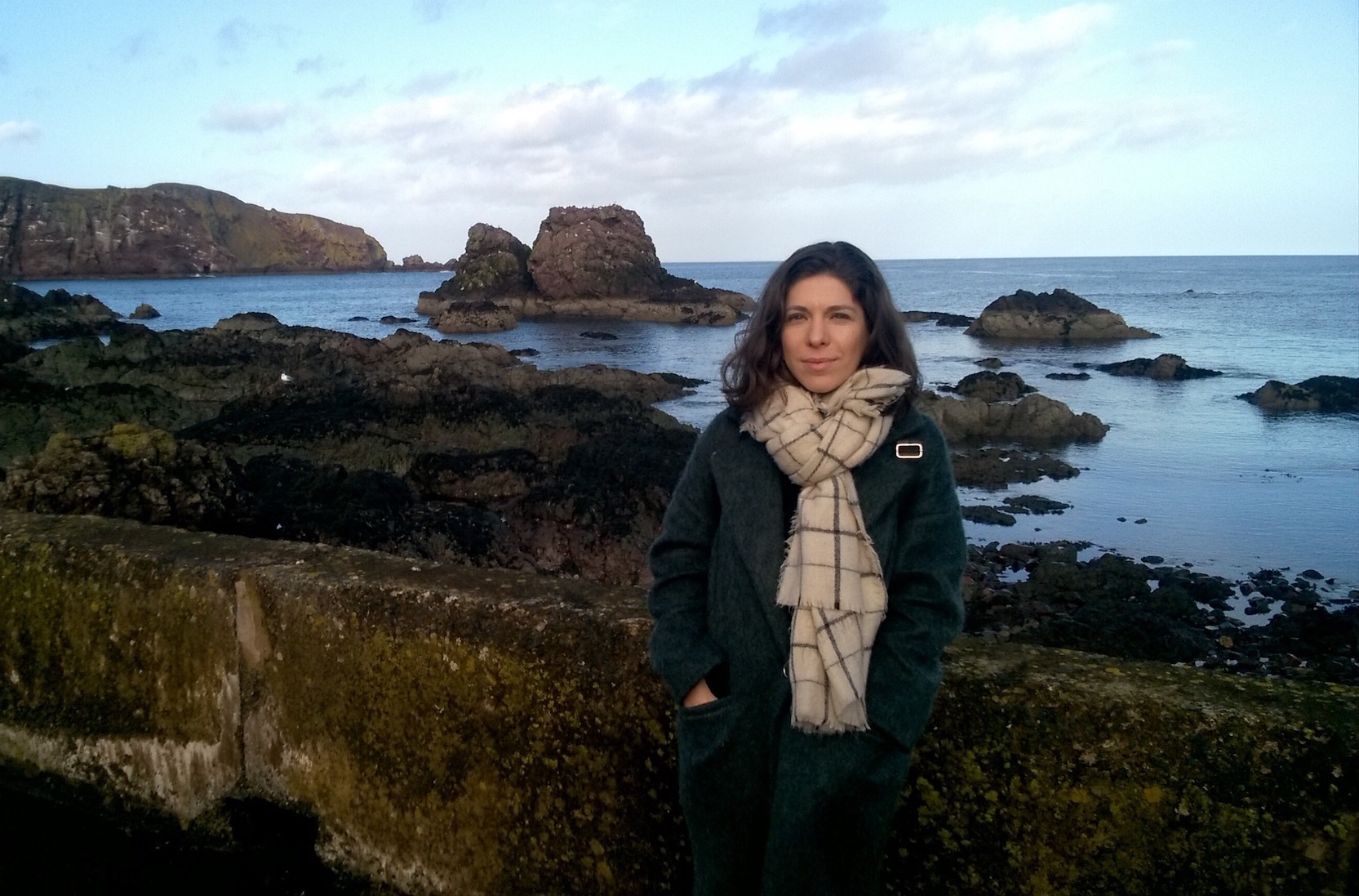 Eszter on the seaside, all dressed for winter