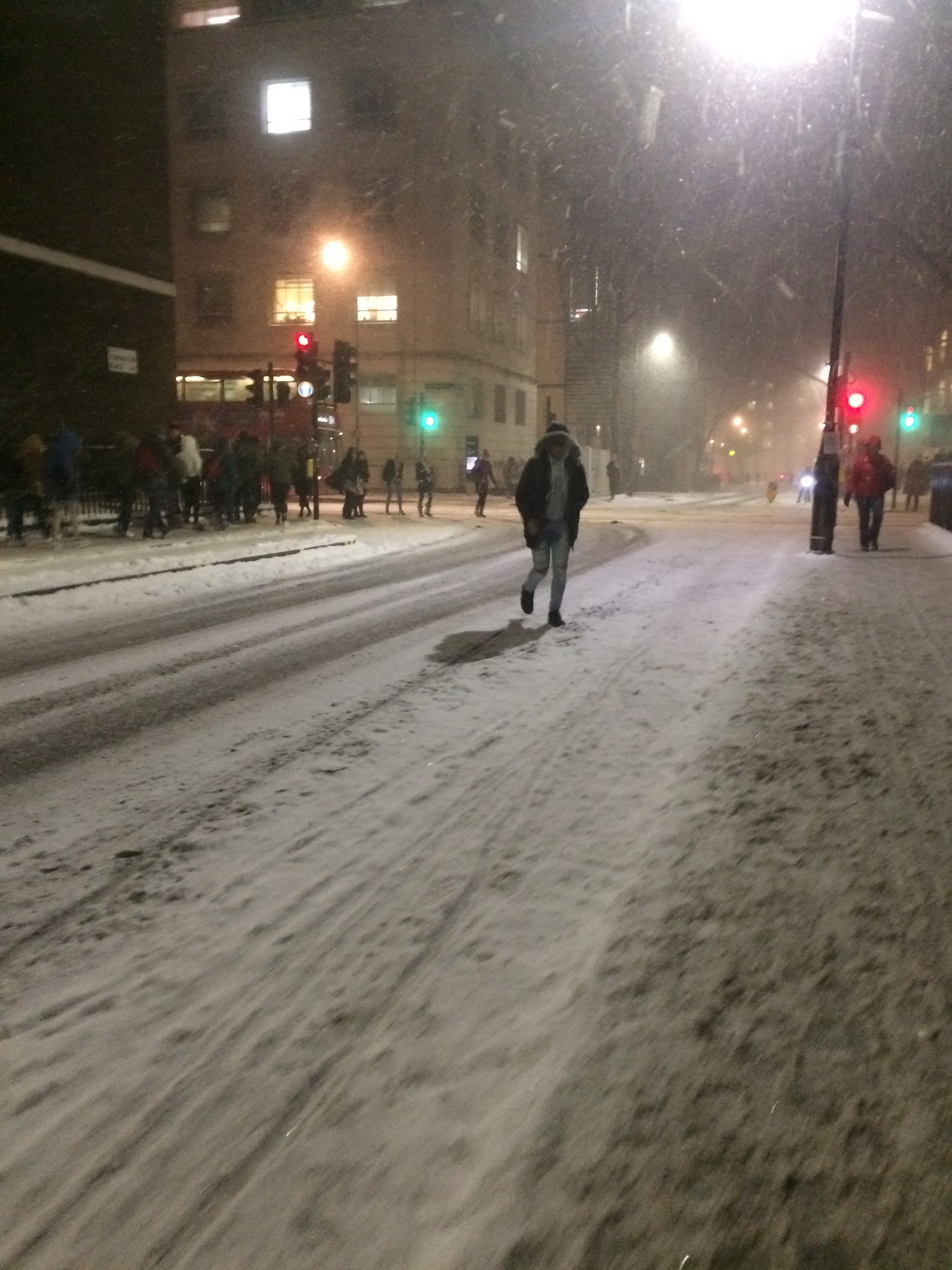 People are trying to navigate the slushy/snowy roads